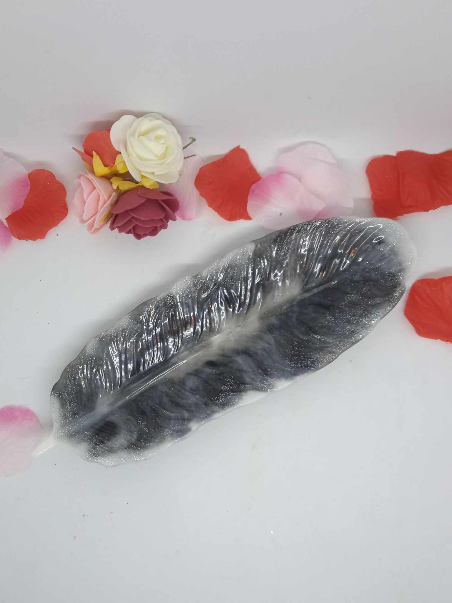 vide poche plume noir et blanc