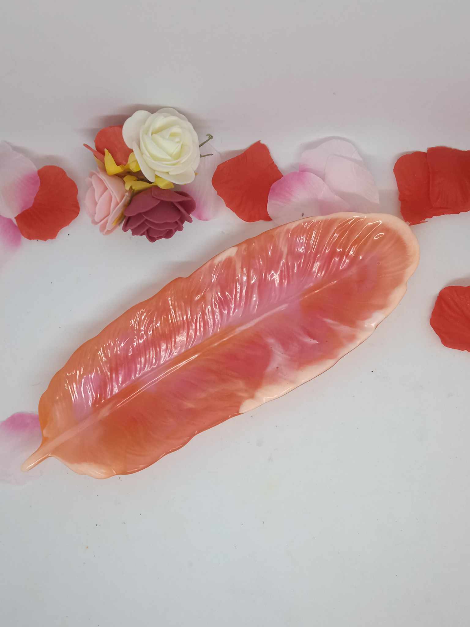 vide poche plume saumon